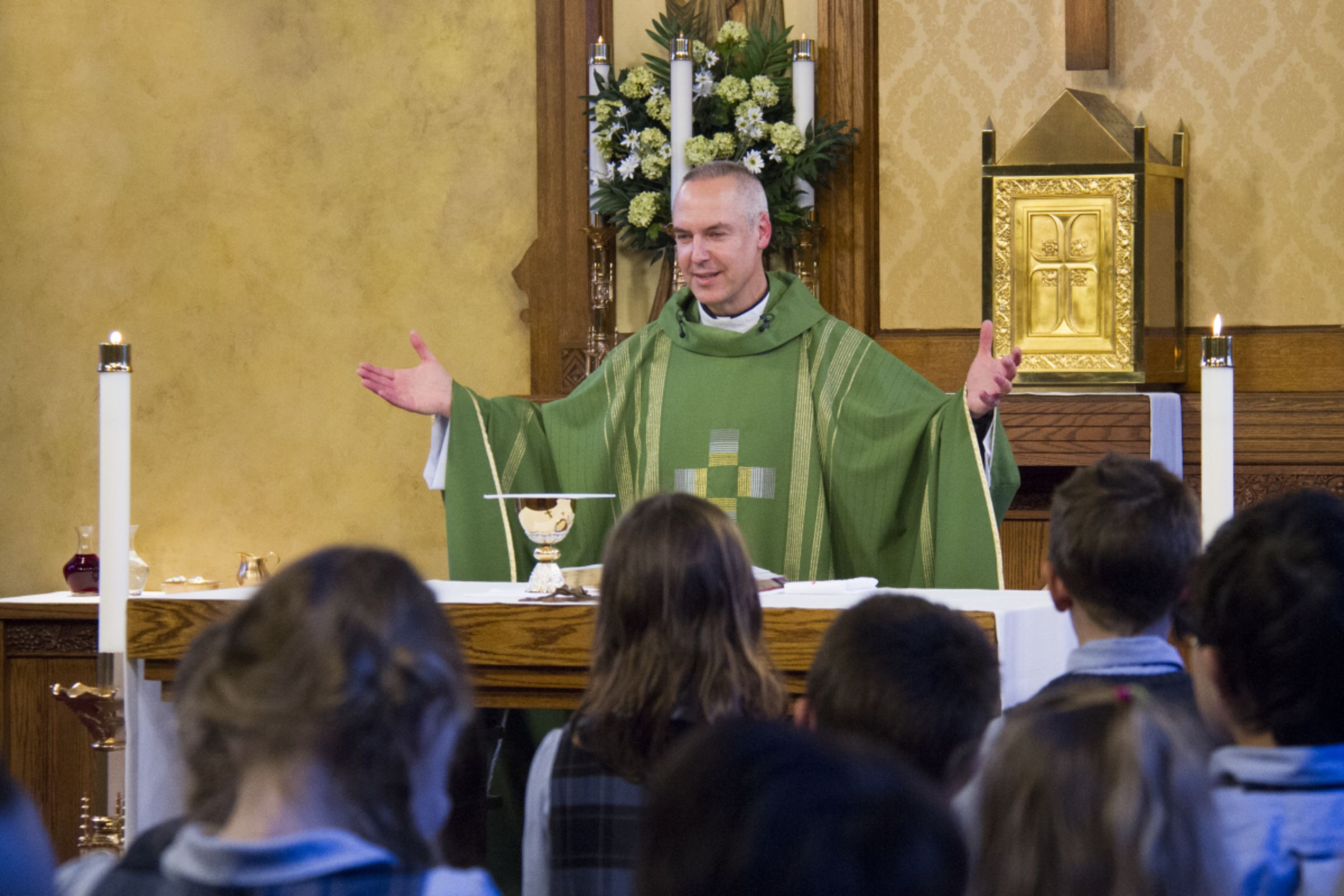 Priest saying Mass at CatholicTV studio chapel
